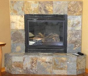 Slate Fireplace installed by Labrador Floors and Tile